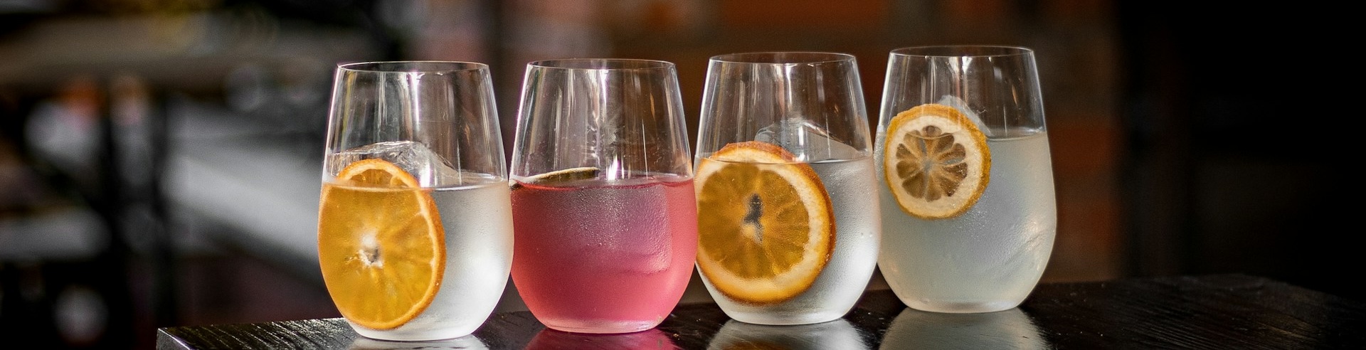 a colourful cocktail on a bar counter